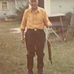 Diane's Grandpa Justin With a Pike caught off his pontoon. "We all fish!"