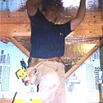 Joshua Grapentin Insulating the shop.